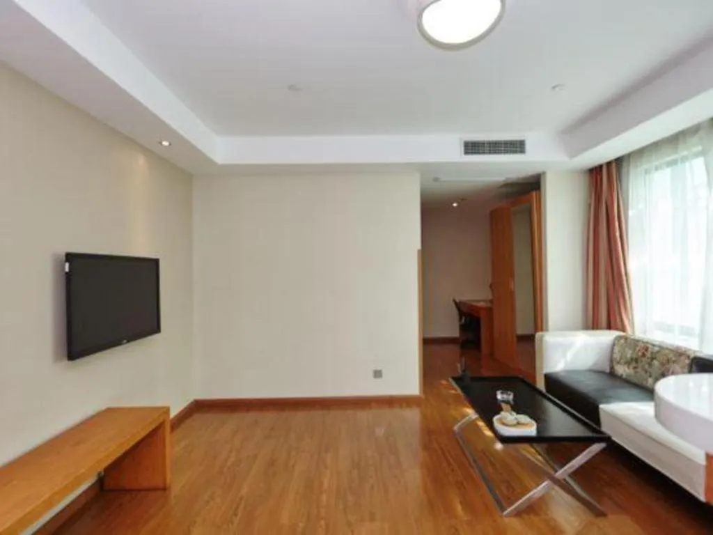 Bed in Warmly Hotel Suzhou Shuanghuwan