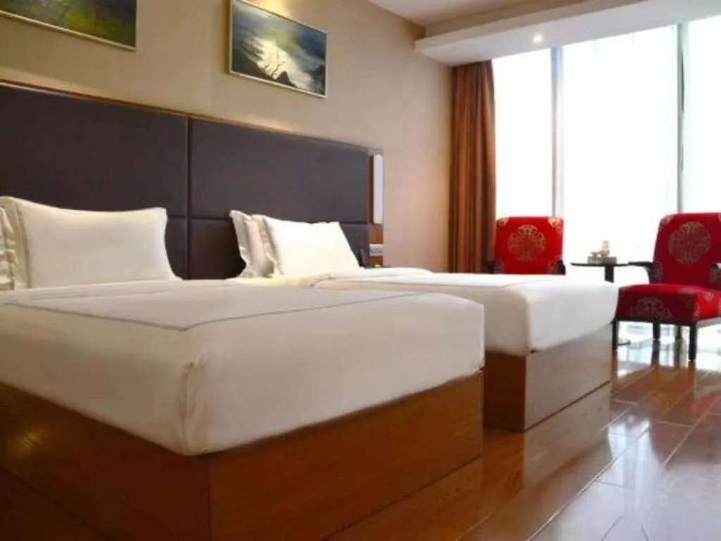 Bed in Warmly Hotel Suzhou Shuanghuwan