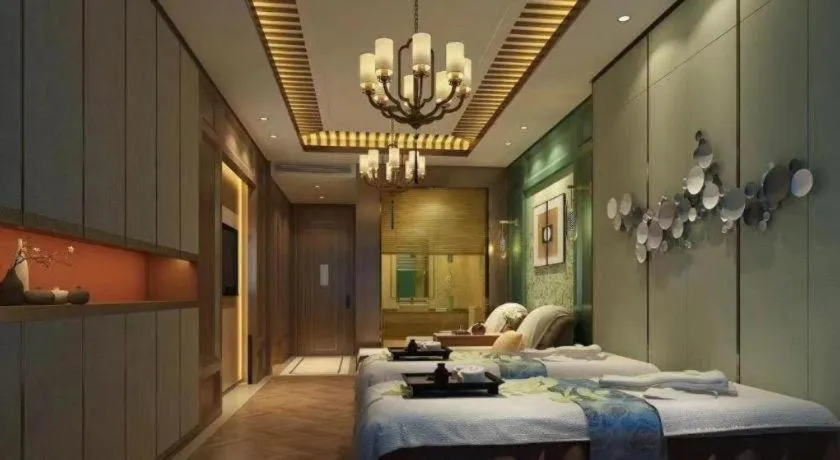 Bed in Warmly Hotel Suzhou Shuanghuwan