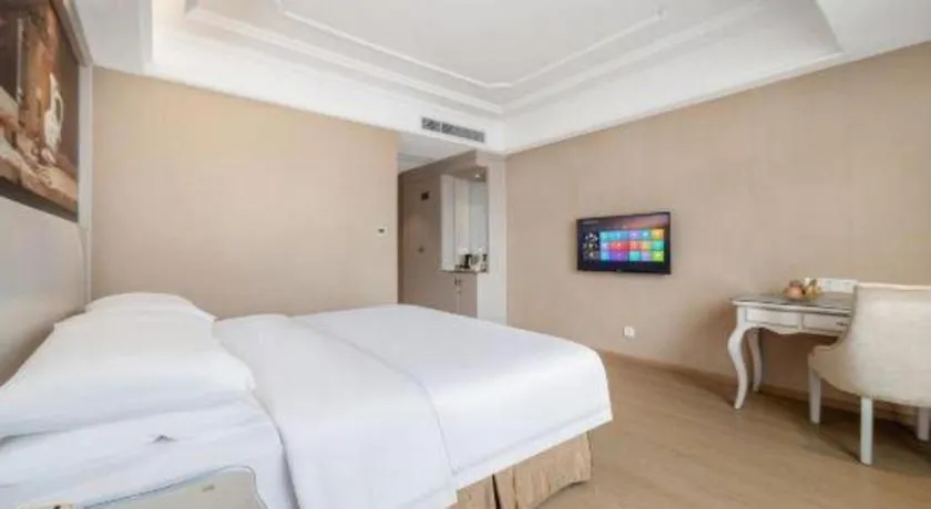 Bed in Vienna Hotel Guiyang Jiaxiulou Jichang Road
