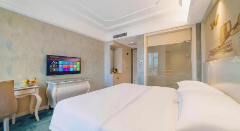 Bed in Vienna Hotel Guiyang Jiaxiulou Jichang Road