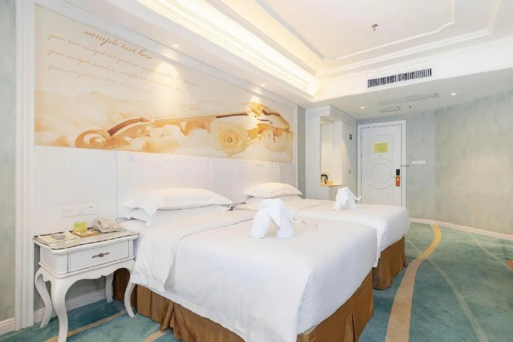 Bed in Vienna Hotel Guiyang Jiaxiulou Jichang Road