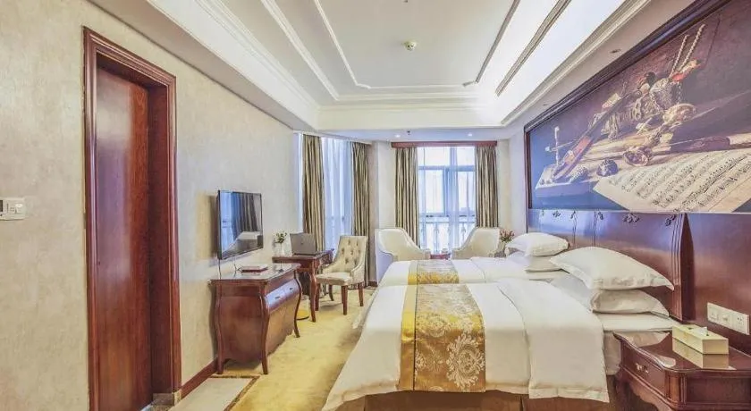 Bed in Vienna Hotel Guiyang Jiaxiulou Jichang Road