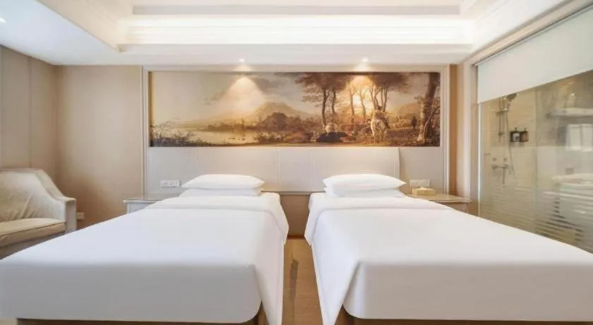 Bed in Vienna Hotel Guiyang Jiaxiulou Jichang Road