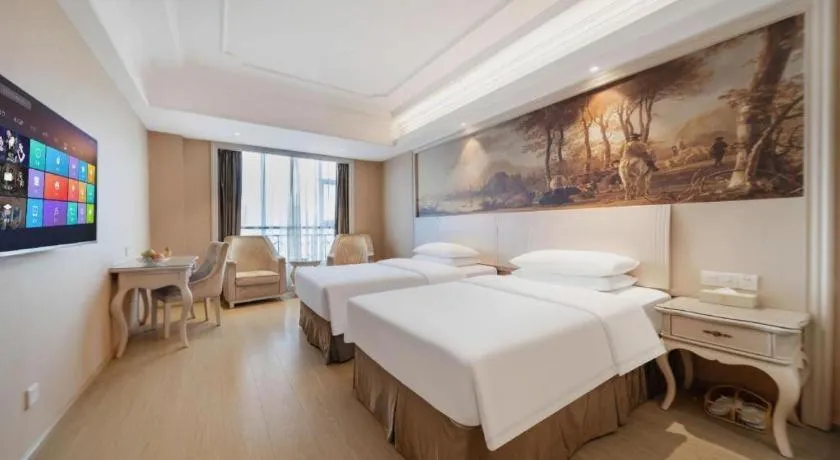 Bed in Vienna Hotel Guiyang Jiaxiulou Jichang Road