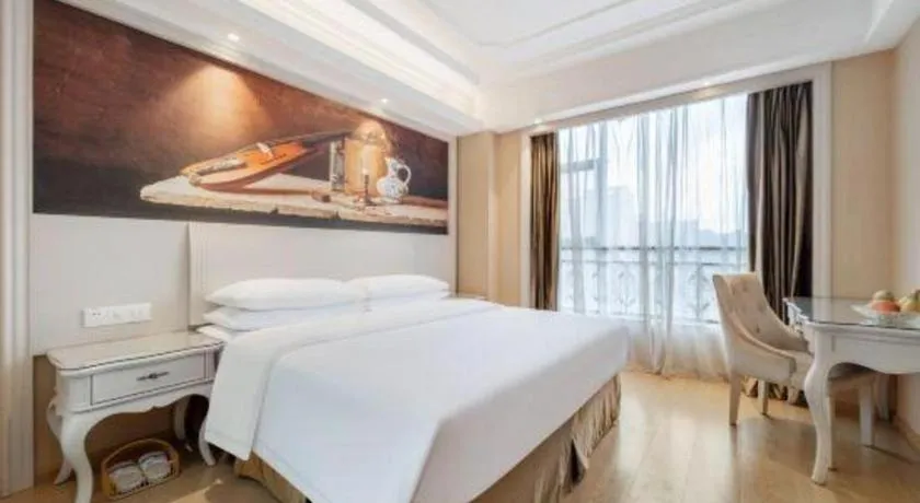 Bed in Vienna Hotel Guiyang Jiaxiulou Jichang Road