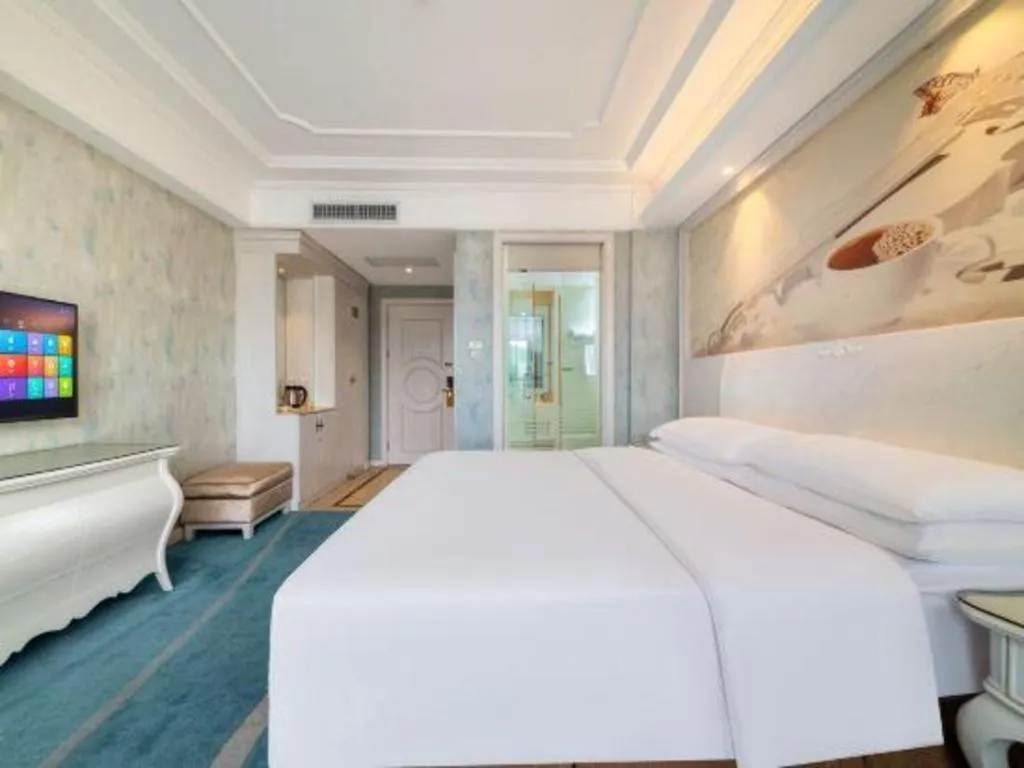 Bed in Vienna Hotel Guiyang Jiaxiulou Jichang Road