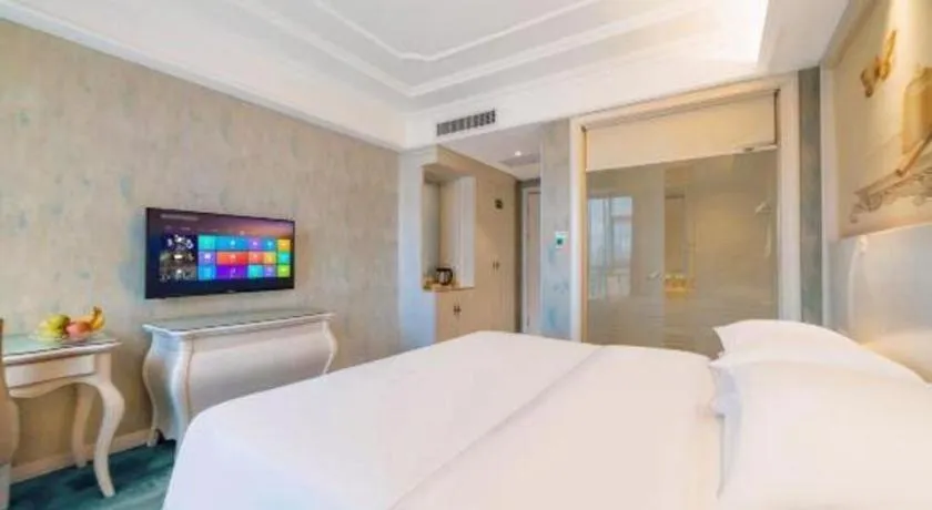 Bed in Vienna Hotel Guiyang Jiaxiulou Jichang Road