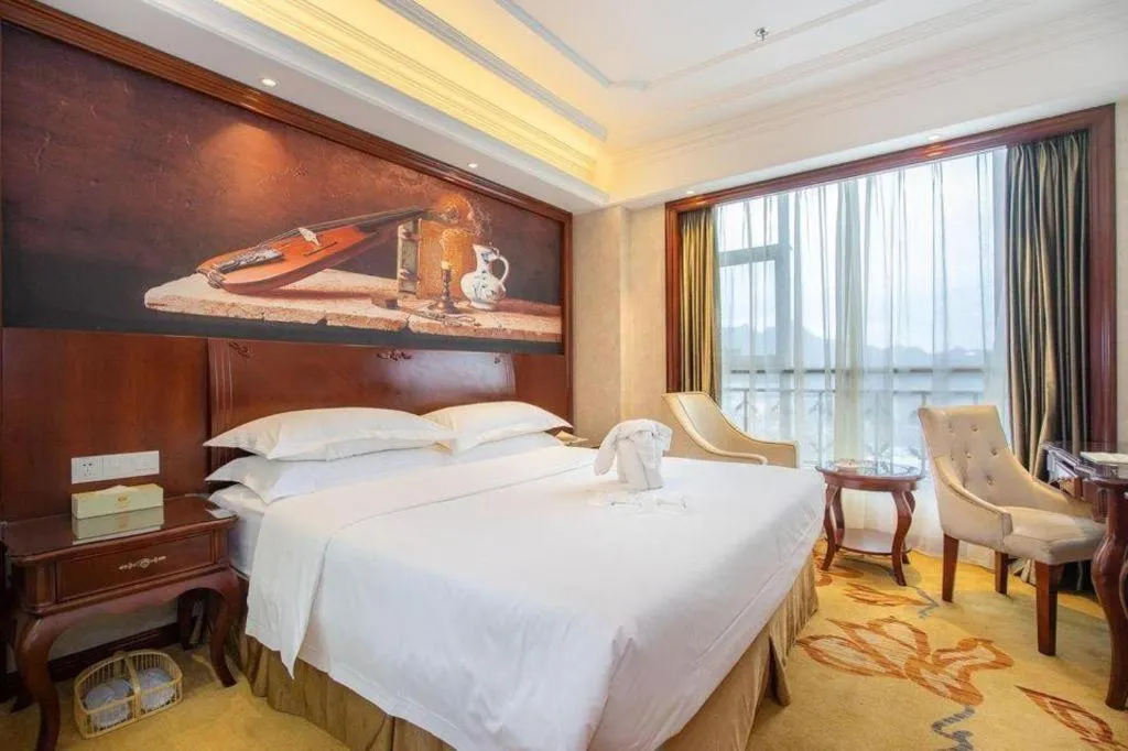 Bed in Vienna Hotel Guiyang Jiaxiulou Jichang Road