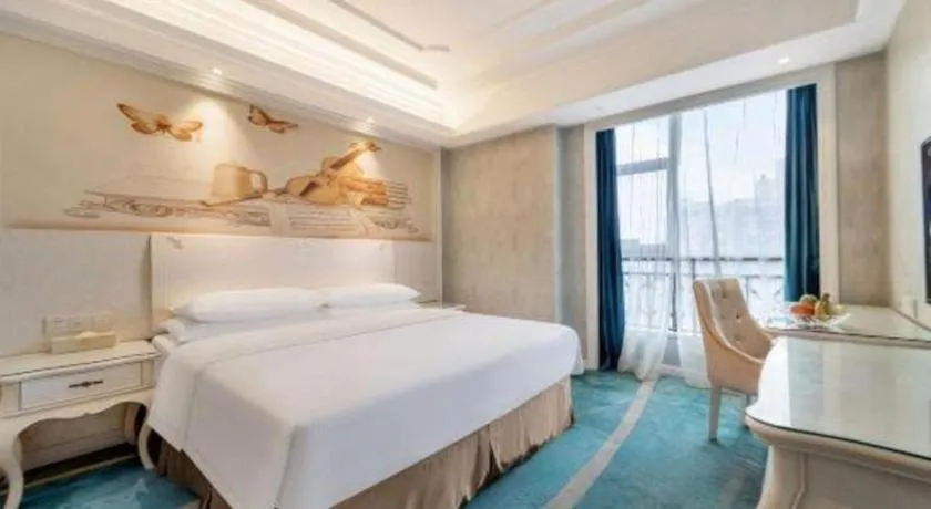 Bed in Vienna Hotel Guiyang Jiaxiulou Jichang Road