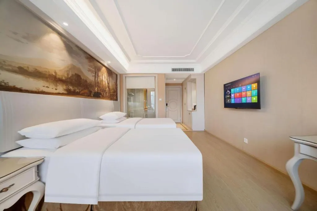 Bed in Vienna Hotel Guiyang Jiaxiulou Jichang Road