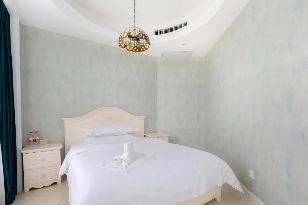 Bed in Vienna Hotel Guiyang Jiaxiulou Jichang Road