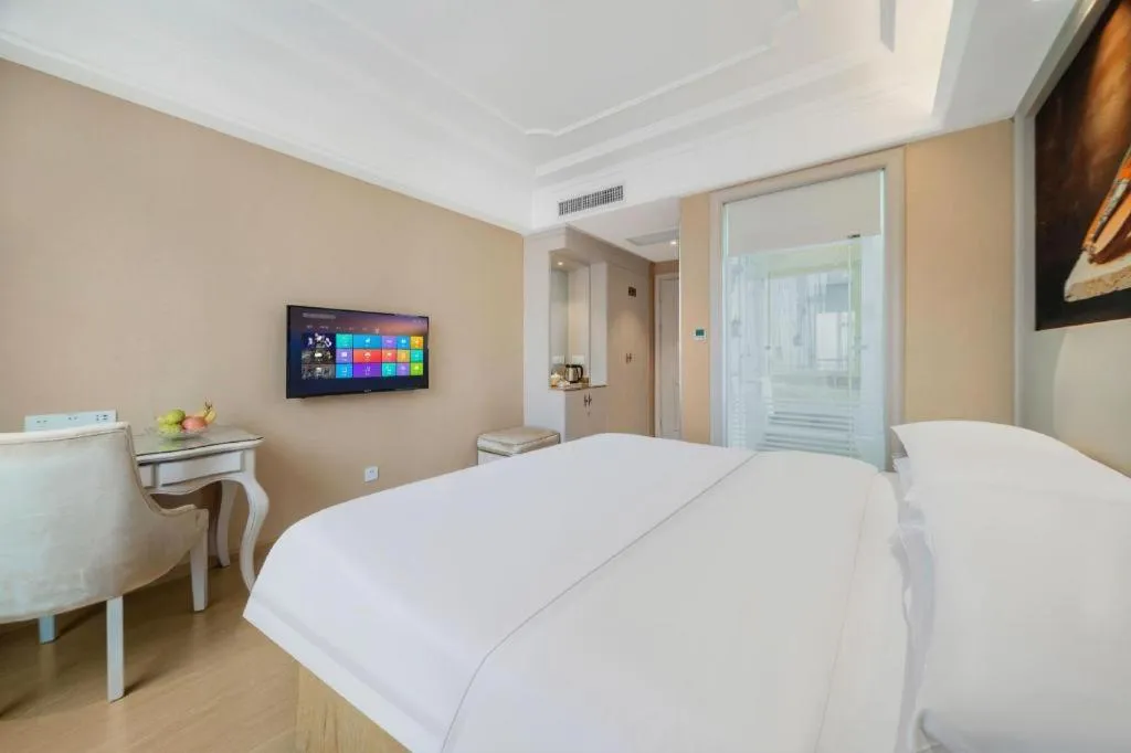 Bed in Vienna Hotel Guiyang Jiaxiulou Jichang Road