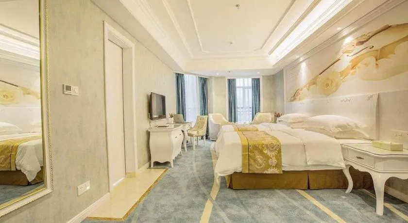 Bed in Vienna Hotel Guiyang Jiaxiulou Jichang Road