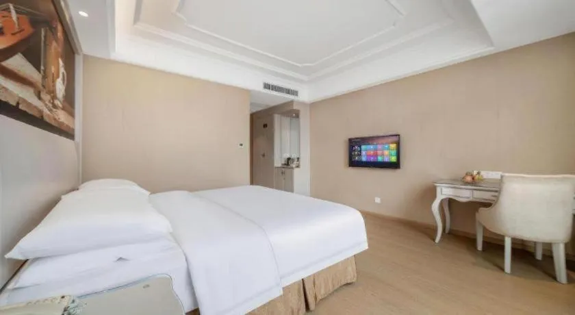 Bed in Vienna Hotel Guiyang Jiaxiulou Jichang Road