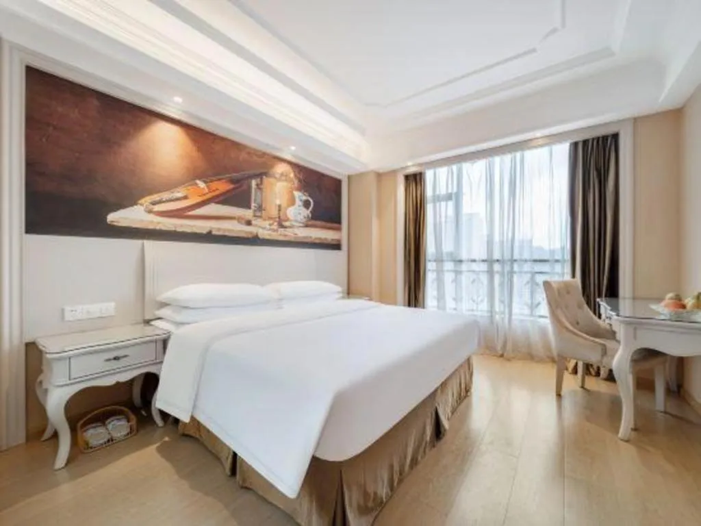 Bed in Vienna Hotel Guiyang Jiaxiulou Jichang Road