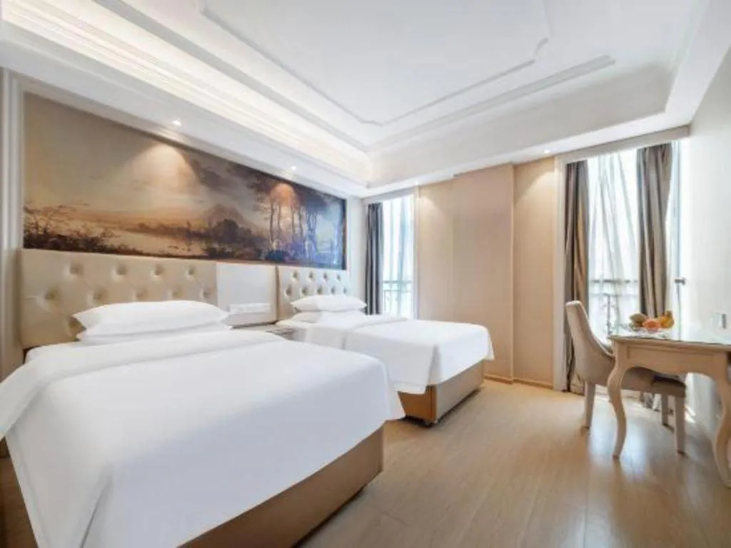 Bed in Vienna Hotel Guiyang Jiaxiulou Jichang Road