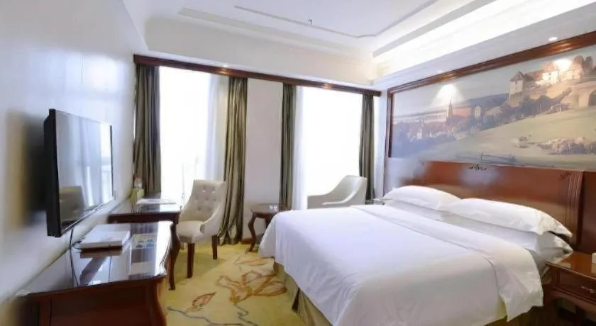 Bed in Vienna Hotel Guiyang Jiaxiulou Jichang Road