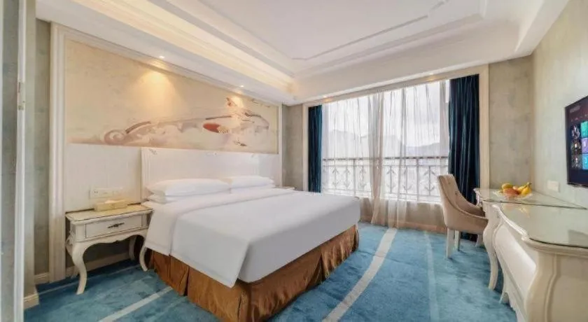 Bed in Vienna Hotel Guiyang Jiaxiulou Jichang Road