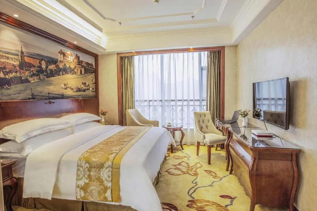 Bed in Vienna Hotel Guiyang Jiaxiulou Jichang Road