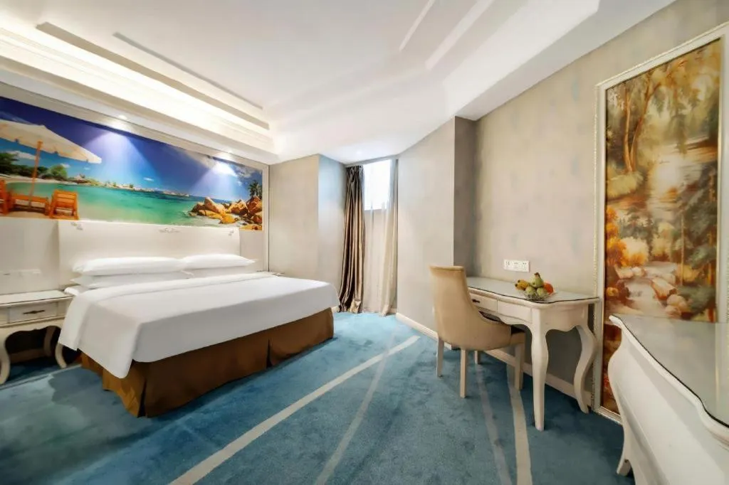 Bed in Vienna Hotel Guiyang Jiaxiulou Jichang Road