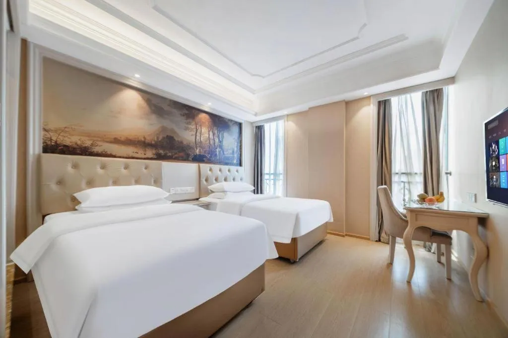 Bed in Vienna Hotel Guiyang Jiaxiulou Jichang Road