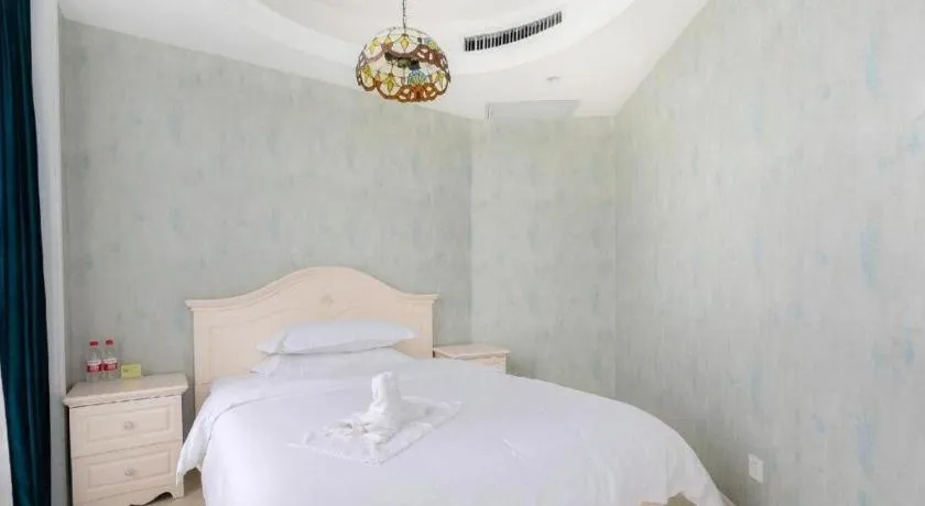 Bed in Vienna Hotel Guiyang Jiaxiulou Jichang Road