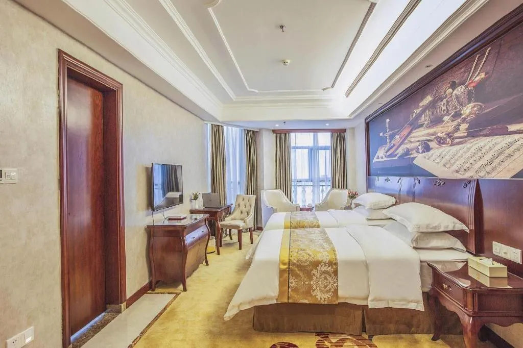 Bed in Vienna Hotel Guiyang Jiaxiulou Jichang Road