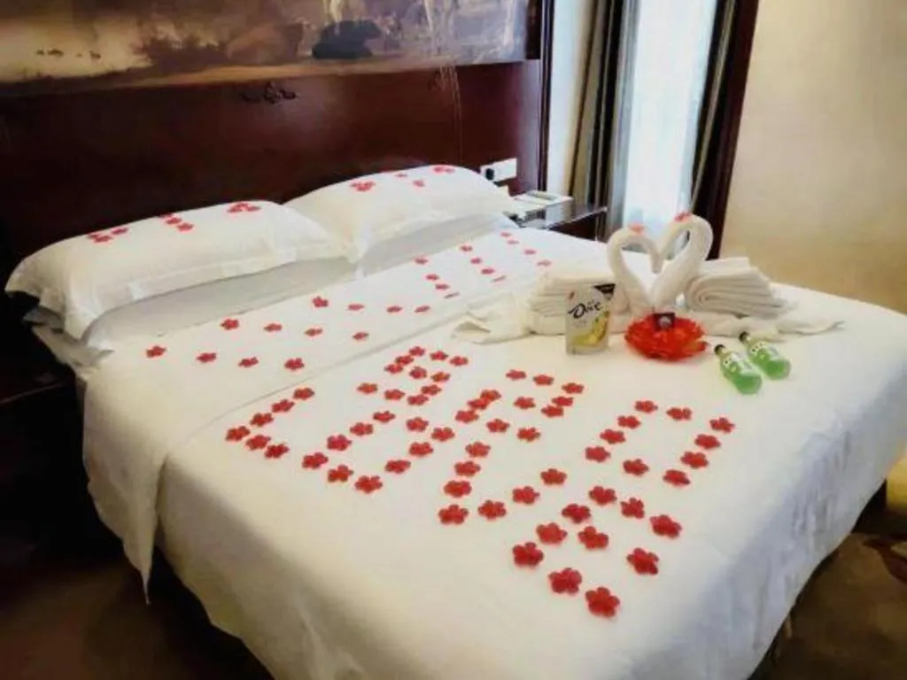 Bed in Vienna Hotel Guiyang Jiaxiulou Jichang Road