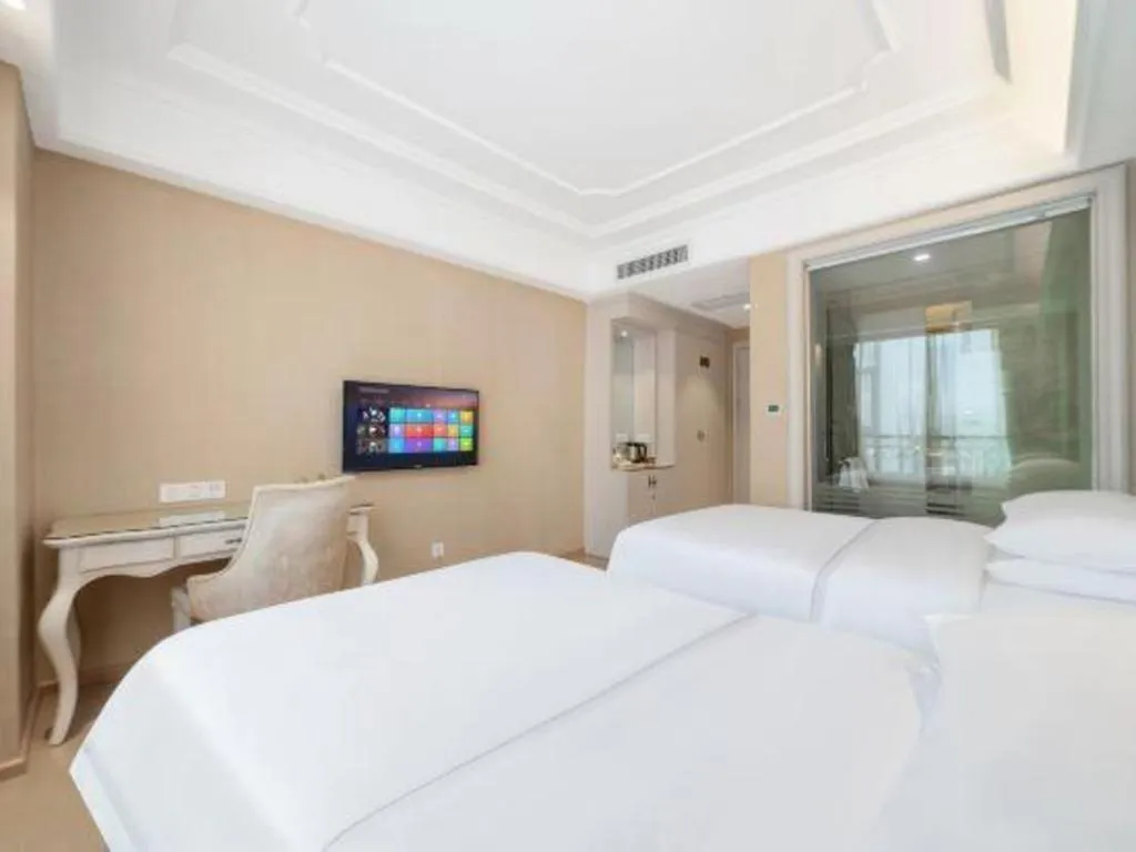 Bed in Vienna Hotel Guiyang Jiaxiulou Jichang Road