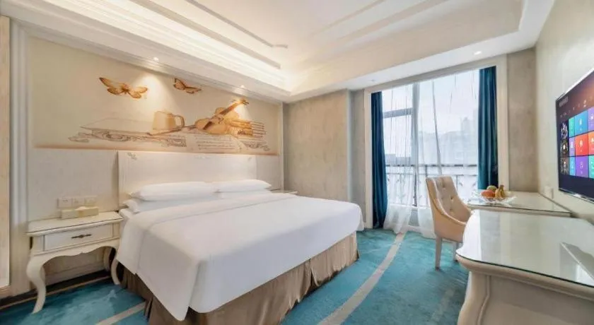 Bed in Vienna Hotel Guiyang Jiaxiulou Jichang Road