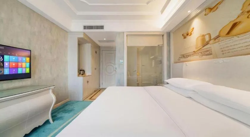 Bed in Vienna Hotel Guiyang Jiaxiulou Jichang Road