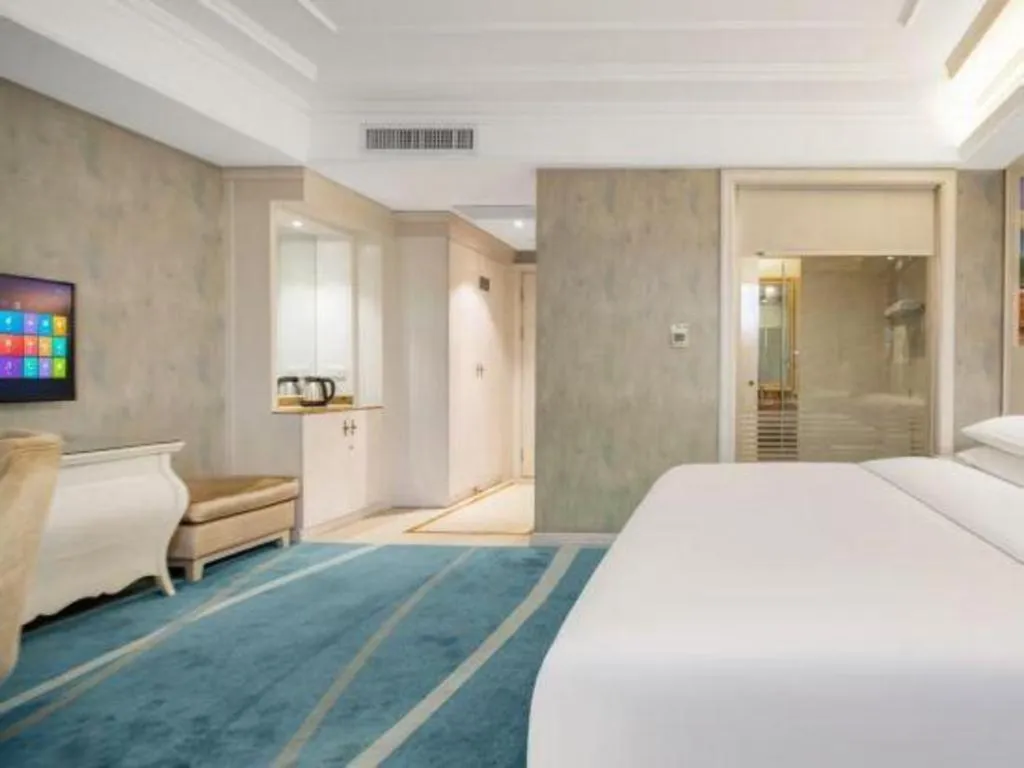 Bed in Vienna Hotel Guiyang Jiaxiulou Jichang Road