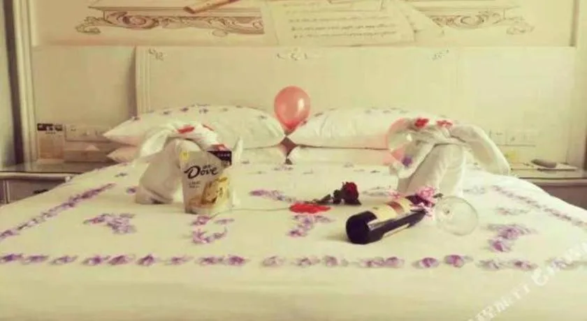 Bed in Vienna Hotel Guiyang Jiaxiulou Jichang Road