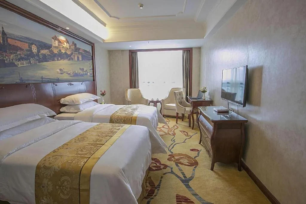 Bed in Vienna Hotel Guiyang Jiaxiulou Jichang Road