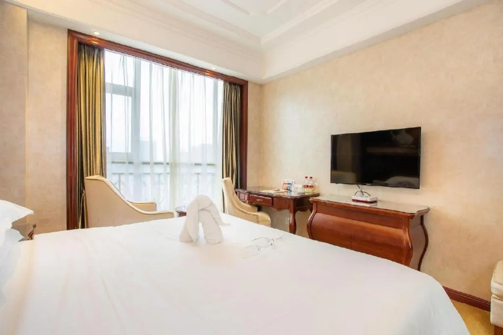 Bed in Vienna Hotel Guiyang Jiaxiulou Jichang Road