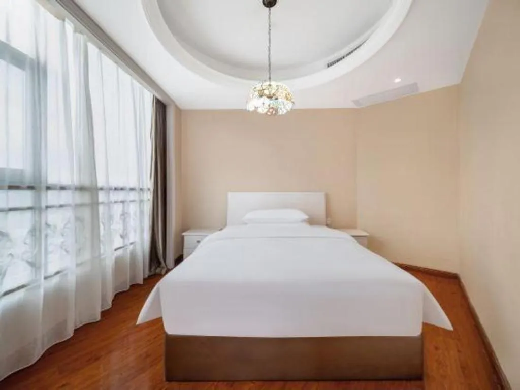 Bed in Vienna Hotel Guiyang Jiaxiulou Jichang Road
