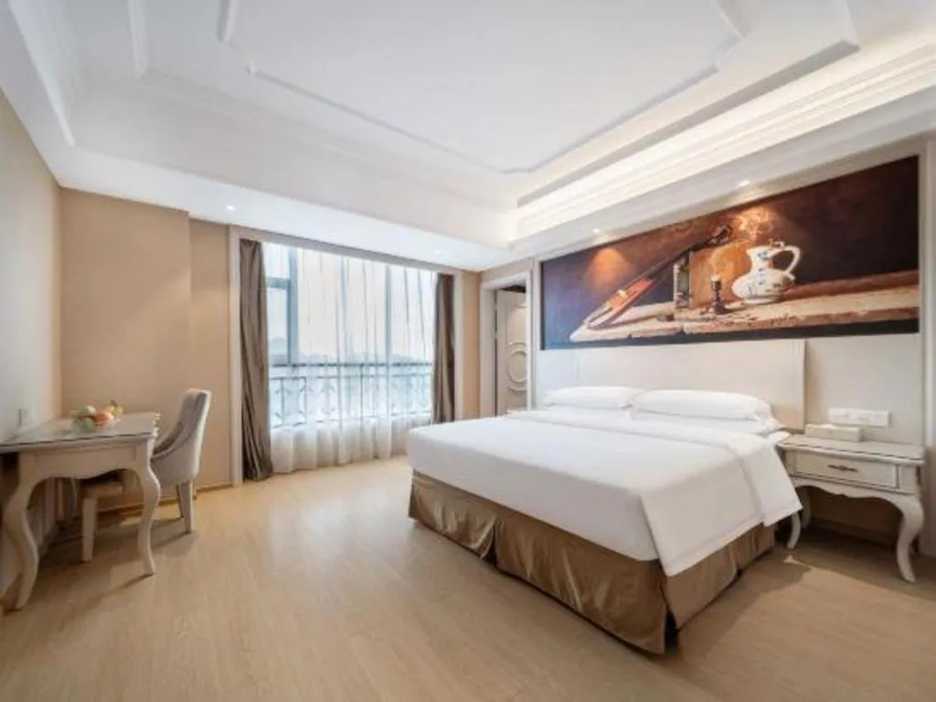 Bed in Vienna Hotel Guiyang Jiaxiulou Jichang Road