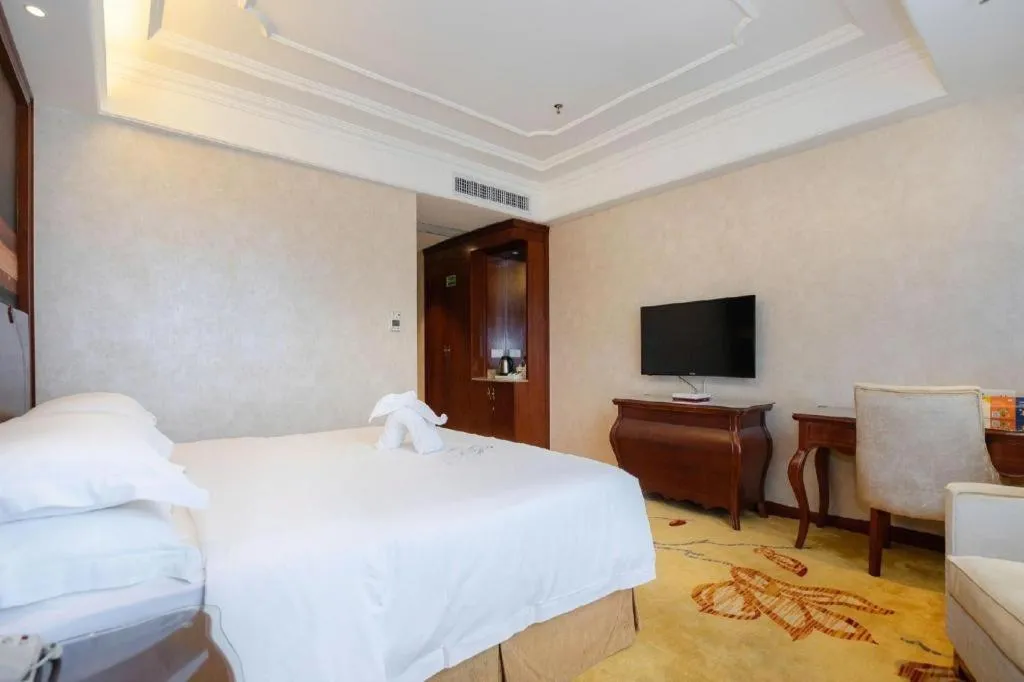 Bed in Vienna Hotel Guiyang Jiaxiulou Jichang Road