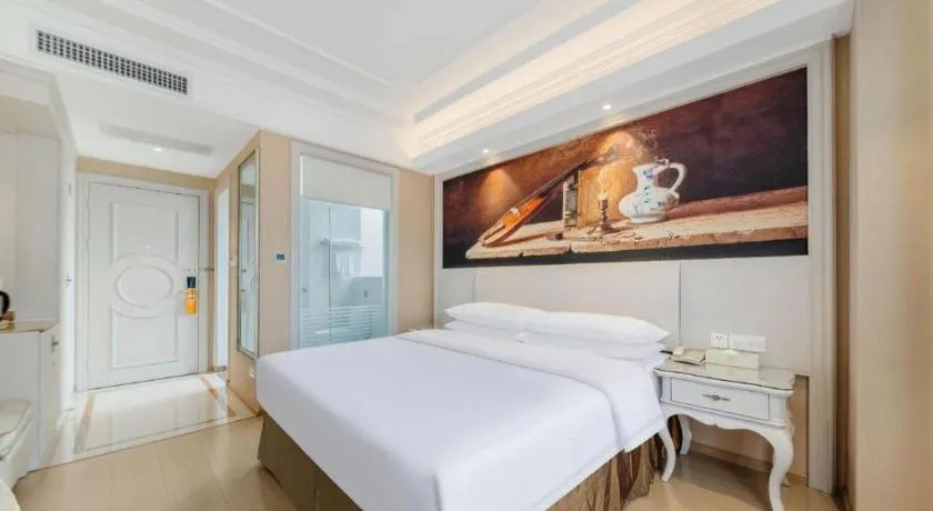 Bed in Vienna Hotel Guiyang Jiaxiulou Jichang Road