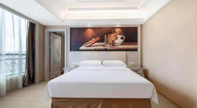 Bed in Vienna Hotel Guiyang Jiaxiulou Jichang Road
