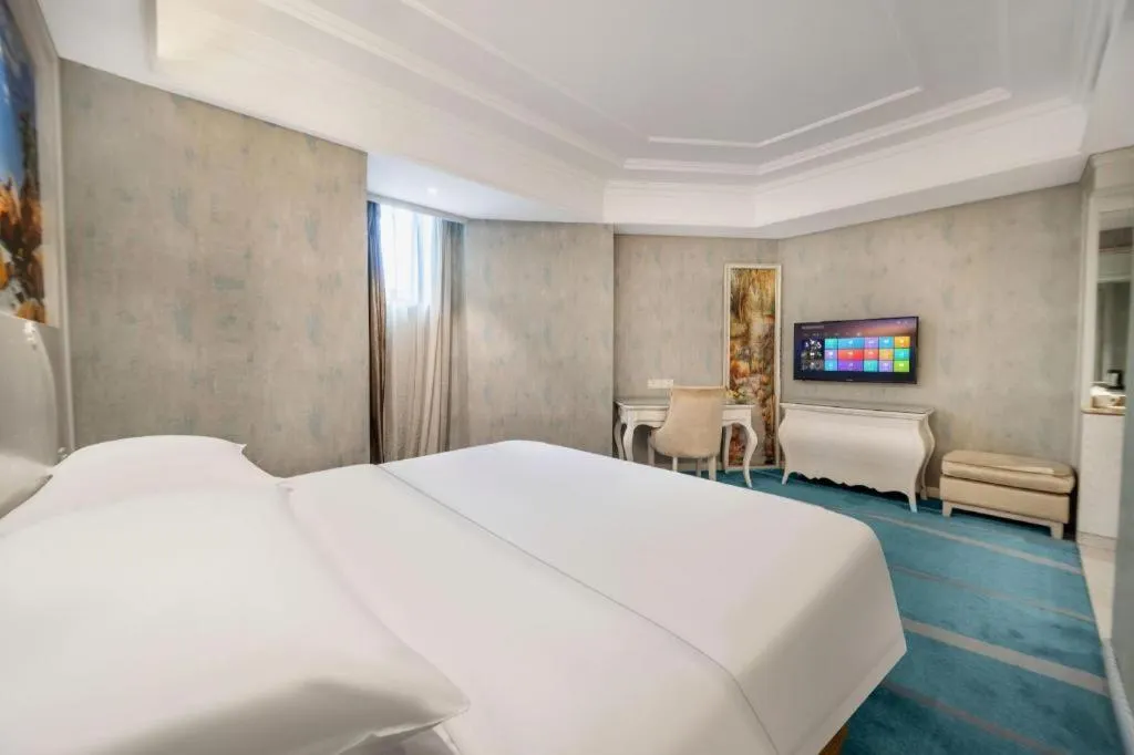 Bed in Vienna Hotel Guiyang Jiaxiulou Jichang Road