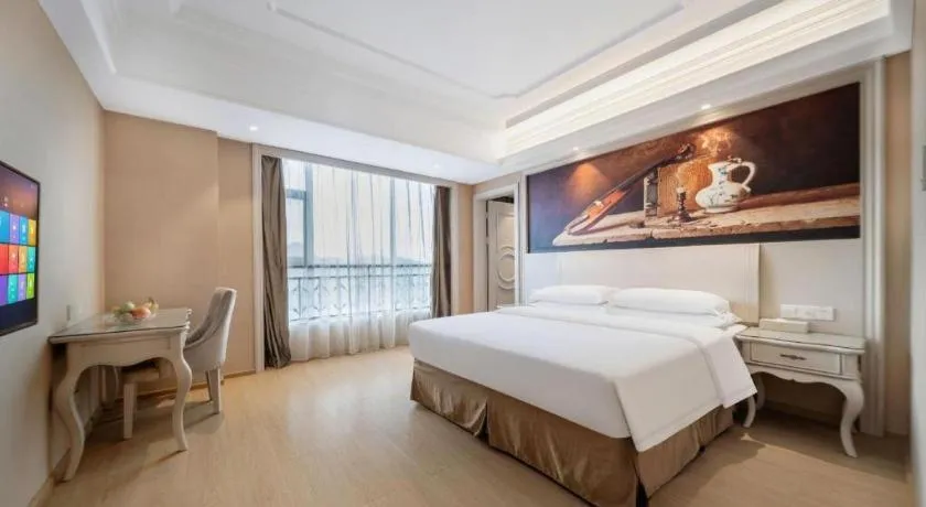 Bed in Vienna Hotel Guiyang Jiaxiulou Jichang Road