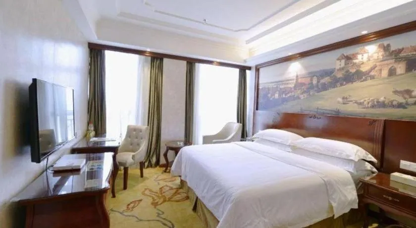 Bed in Vienna Hotel Guiyang Jiaxiulou Jichang Road