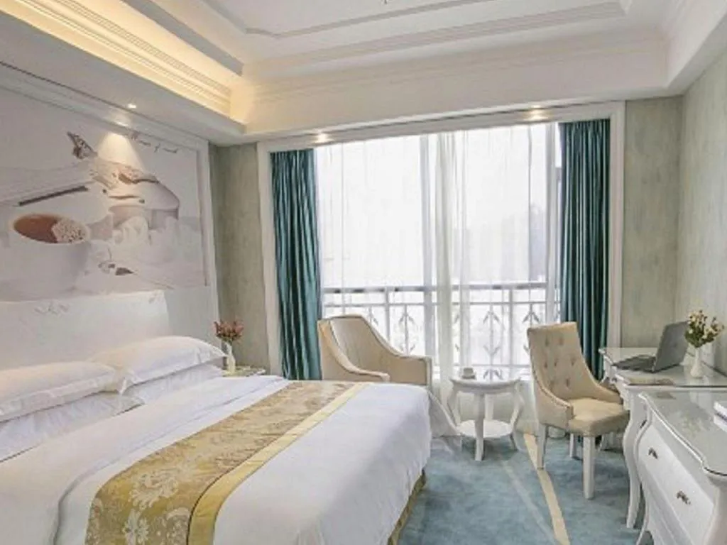 Bed in Vienna Hotel Guiyang Jiaxiulou Jichang Road