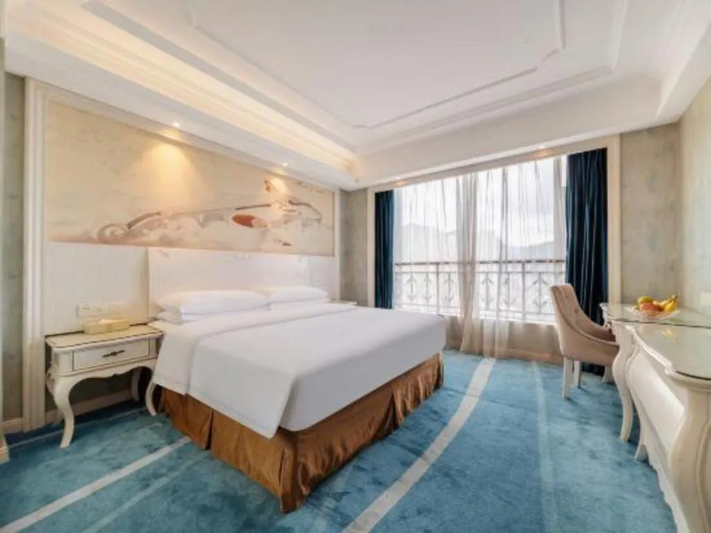 Bed in Vienna Hotel Guiyang Jiaxiulou Jichang Road