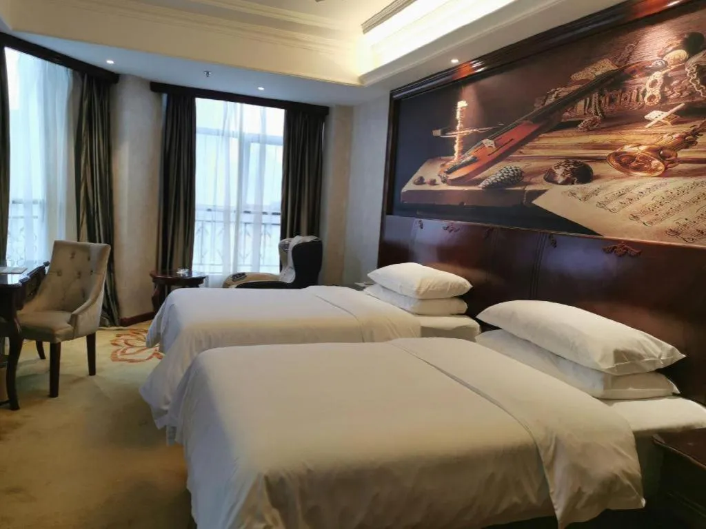 Bed in Vienna Hotel Guiyang Jiaxiulou Jichang Road