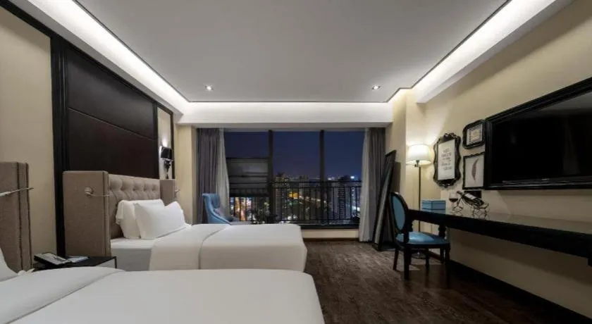 Bed in Xana Hotelle Chengdu East Railway Station Kaide Plaza