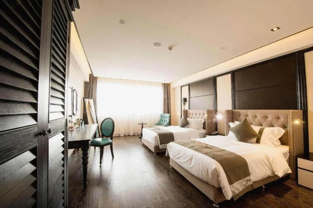 Bed in Xana Hotelle Chengdu East Railway Station Kaide Plaza