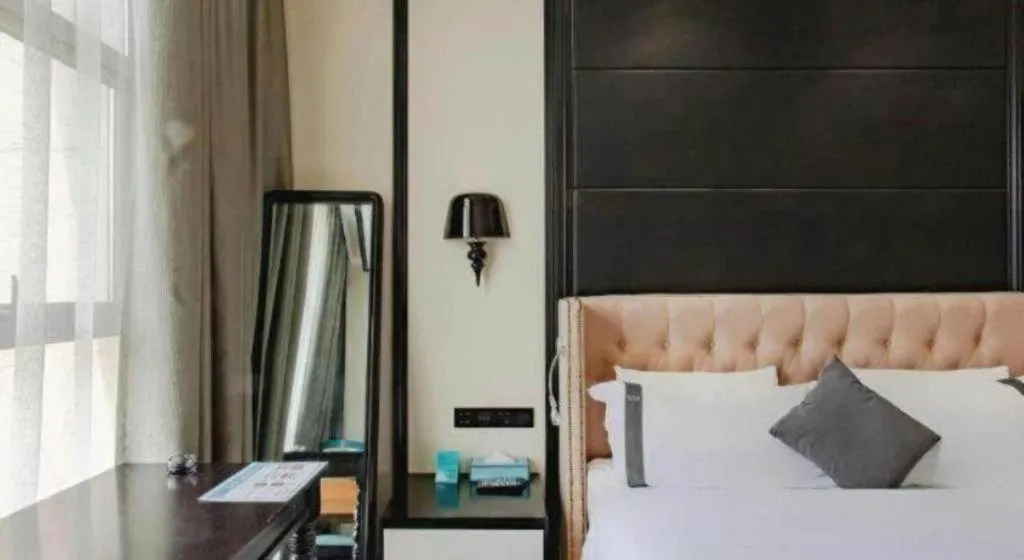 Bed in Xana Hotelle Chengdu East Railway Station Kaide Plaza